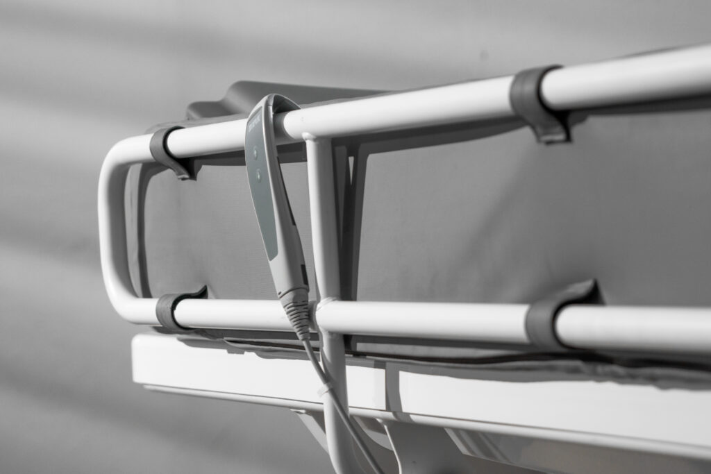 MobiCare electric shower stretcher with hand control