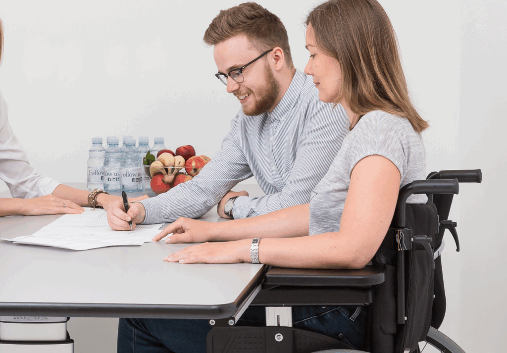 Vision group table with wheelchair user