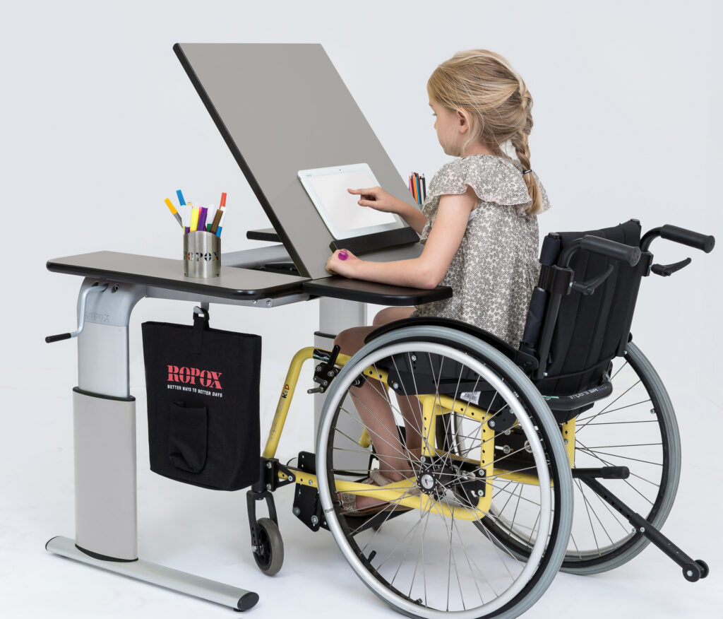 height adjustable vision table with wheelchair user