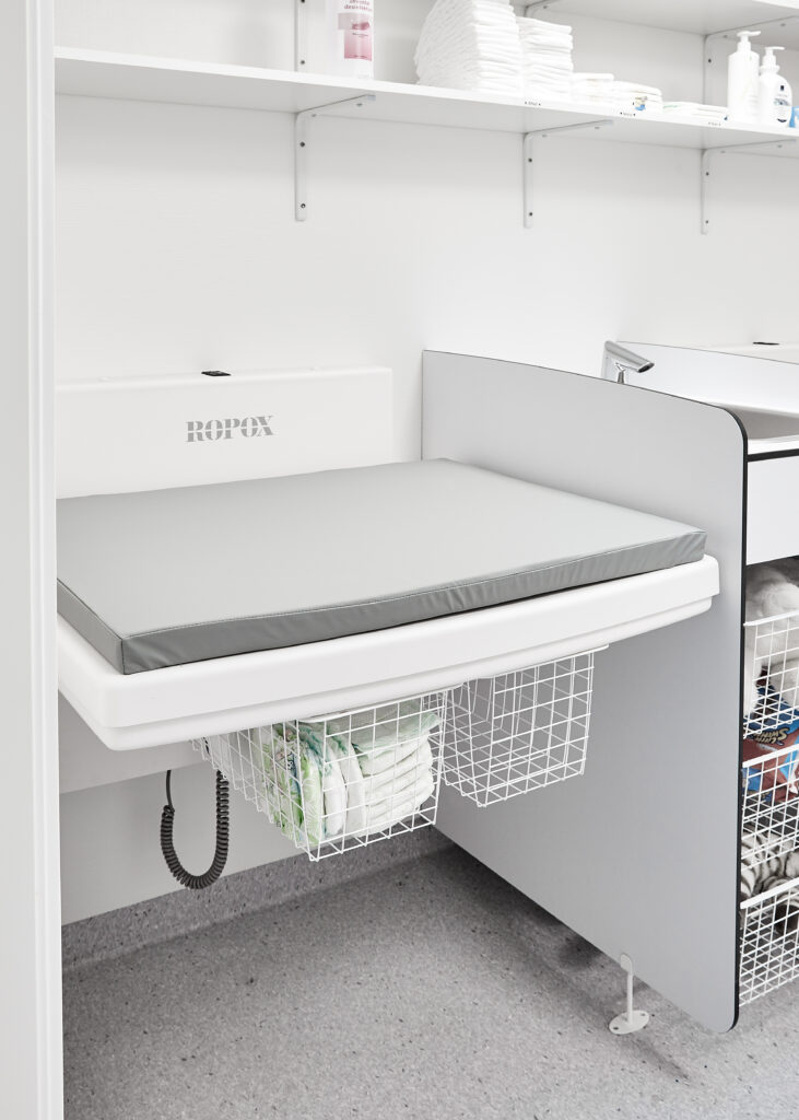medi2 height adjustable changing table for children